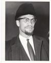 (AFRICAN AMERICANS.) Group of 3 press photographs of civil rights leaders: Malcolm X, Martin Luther King, and Medgar Evers.